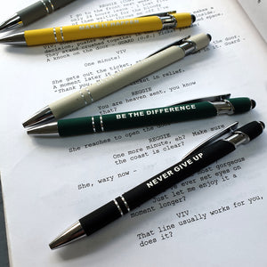 A film script with five affirmation pens in a zigzag formation 